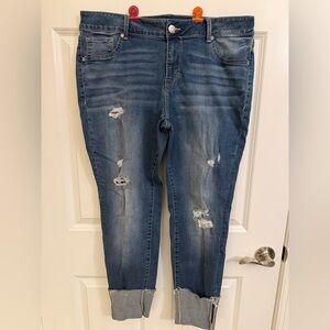 Maurice’s 16W distressed mid-rise boyfriend jeans with a cuffed hem.